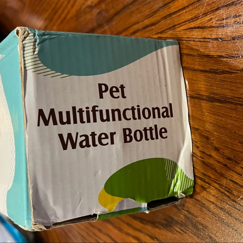 Pet Multifunctional Water Bottle with some little plastic bag inside New